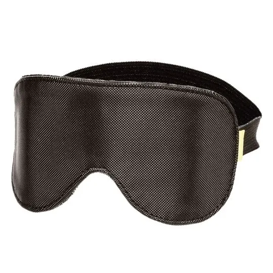 Masque pour les yeux ajustable CALEXOTICS en cuir végétalien noir, double rembourrage pour obscurité totale.