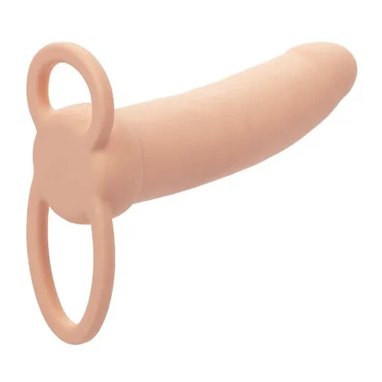 Thick double penetrator Calexotics Maxx Thick flesh tone with 10 vibration modes and scrotal ring