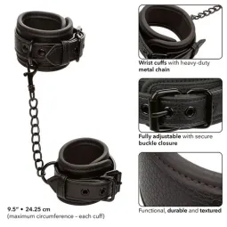 Poignets en cuir réglables noirs CALEXOTICS, accessoire BDSM ajustable avec boucle sécurisée.