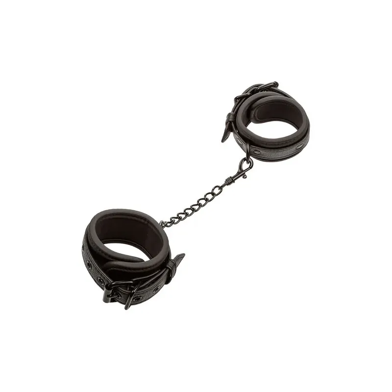 Poignets en cuir réglables noirs CALEXOTICS, accessoire BDSM ajustable avec boucle sécurisée.