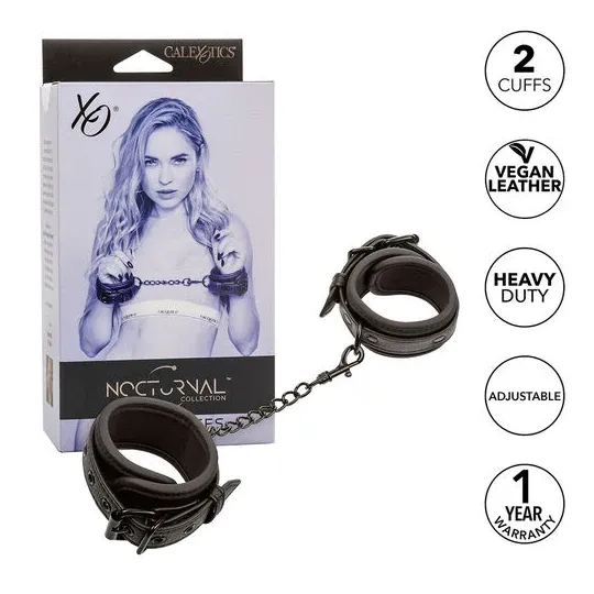 Poignets en cuir réglables noirs CALEXOTICS, accessoire BDSM ajustable avec boucle sécurisée.