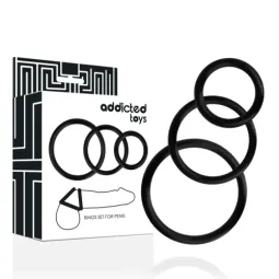 Set di tre anelli penieni neri Addicted Toys in gomma super elastica - panoramica taglie S M L