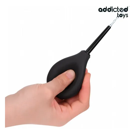 Addicted Toys pulitore anale Travel Size 90 ml in silicone trasparente, vista frontale - pera anale compatta per igiene