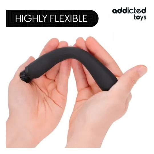 Ducha anal Addicted Toys blanca con adaptador universal, PVC silicona flexible" }, { "fr": "Gros plan buse en silicone ultra-dou
