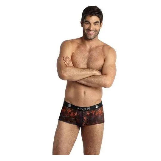 Fotografía de un boxer hombre de tul negro con estampado de palmeras colorido, corte deportivo piernas largas - ANAIS MEN