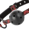 Bavaglio BDSM BEGME Red Edition in pelle vegana rossa con fori di ventilazione e cinghia regolabile.