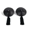 Black reusable pasties with pom-poms by Bijoux Burlesque Pasties, self-adhesive burlesque accessory for sensual dance.