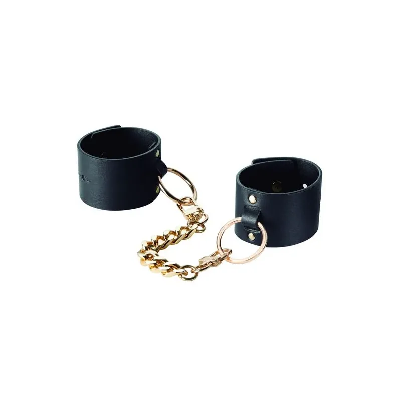 Esposas anchas negras de bondage en cuero vegano, marca Bijoux Maze, doble uso como pulsera y esposas.