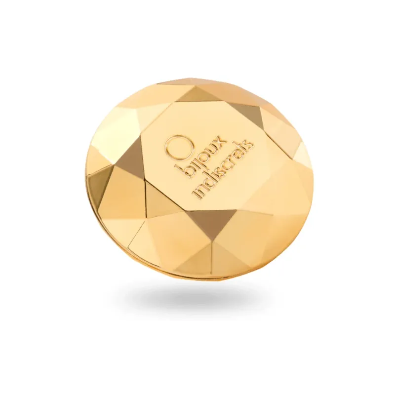 Vibrateur clitoridien en forme de diamant doré de la marque Bijoux 21, pour stimulation externe.