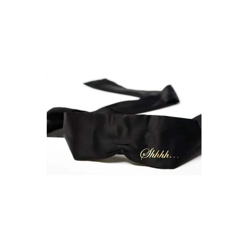Maschera erotica in raso nero Bijoux Indiscrets, con nastro e messaggi Shhh e Ohhh, gioco di coppia.
