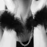 Menottes en plumes réglables Bijoux Indiscrets pour jeux de bondage sensuels et passionnés