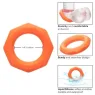 Anneau pénien CalExotics Alpha Sexagon en silicone orange, design hexagonal extensible, pour endurance et plaisir.