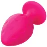 Plug anale rosa in silicone CALEXOTICS con base ventosa, tenuta sicura e texture varia per sensazioni intense.