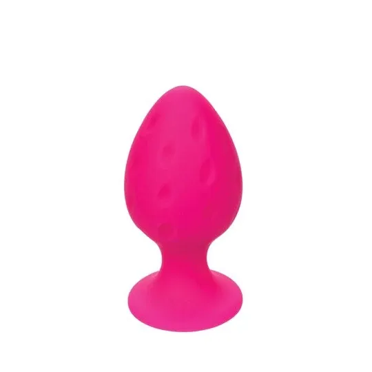 Plug anale rosa in silicone CALEXOTICS con base ventosa, tenuta sicura e texture varia per sensazioni intense.