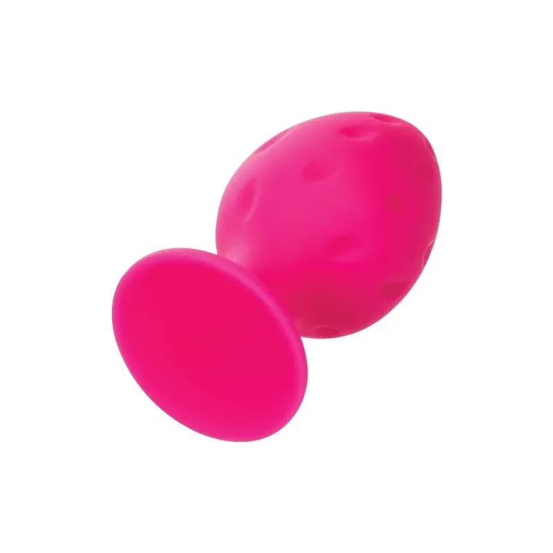 Plug anale rosa in silicone CALEXOTICS con base ventosa, tenuta sicura e texture varia per sensazioni intense.
