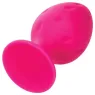 Plug anale rosa in silicone CALEXOTICS con base ventosa, tenuta sicura e texture varia per sensazioni intense.