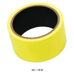 Ruban de bondage auto-adhésif jaune CALEXOTICS, longueur 18 mètres, réutilisable et repositionnable.